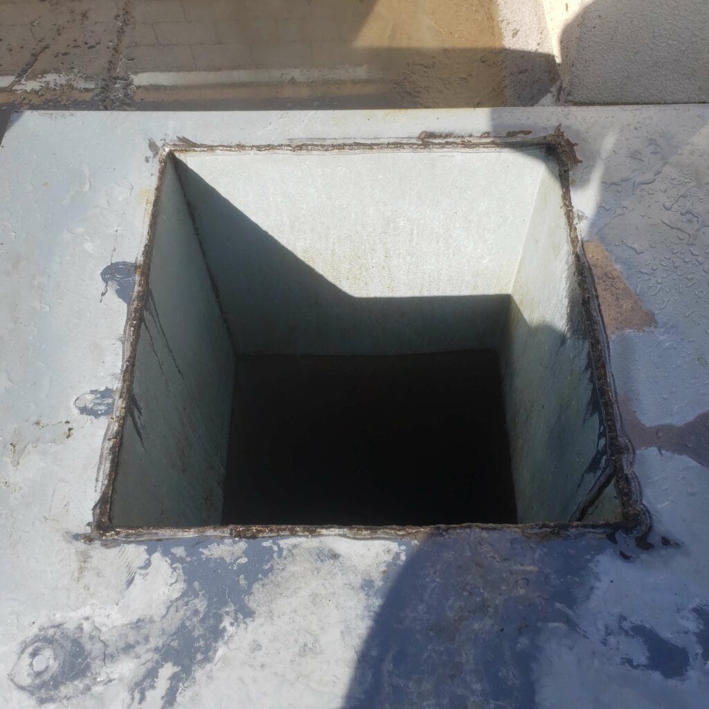 Commercial kitchen exhaust duct access before cleaning